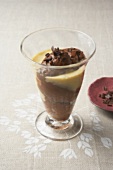 Mousse au chocolate with custard in a sundae glass