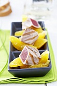 Grilled tuna on orange segments