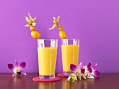 Two glasses of exotic fruit smoothie