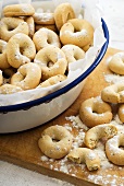 Aniseed rings on a wooden board and in a dish