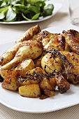 Roast lemon chicken with potatoes and thyme
