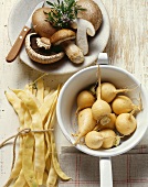 Vegetable still life: mushrooms, beans and Teltow turnips
