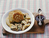 Green spelt pancakes with ceps and elderberry compote