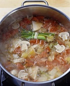 Vegetable stock boiling in a pan
