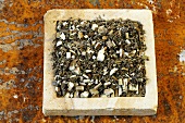 Dried mugwort herb on a stone slab