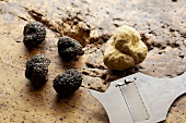 One Alba truffle & four Périgord truffles with truffle slicer