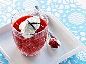 Berry puree with fresh goat's cheese in a glass