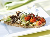 Toasted wholemeal bread topped with grilled vegetables