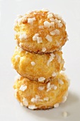 Three chouquettes with pearl sugar (Choux pastries, France)