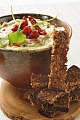 Chick-pea puree with dried tomatoes and black bread