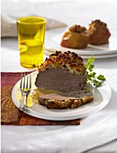 Beef fillet with apple and onion crust and baked apples
