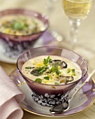 Oyster soup in two glass bowls