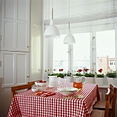 Laid table with strawberries and juice