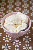 Ricotta in a bowl with a spoon