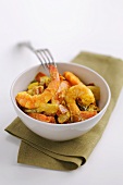 Curried prawns in a small bowl