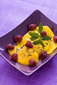 Marinated mango with raspberries and mint
