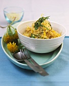 Millet risotto with dandelion and Alpine cheese