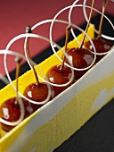 Glazed cherries in pastry case