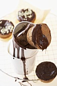 Icing muffins with chocolate icing