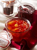 Cherry and sour cherry jam in preserving jars