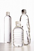 Three plastic bottles of water
