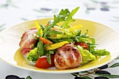 Fried pancetta-wrapped fresh goat's cheese with mixed salad