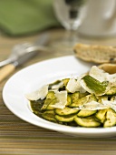Fried courgettes with pesto and Parmesan