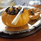 Pumpkin stuffed with lentils, bacon and sweet chestnuts