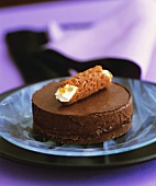 Chocolate hazelnut mousse cake, brandy snap with passion fruit cream