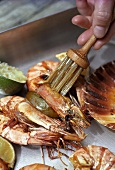 Brushing barbecued seafood