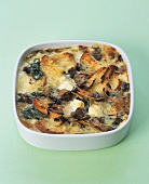 Savoury bread & butter pudding with goat's cheese & spinach