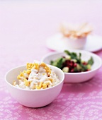 Deep-fried pearl barley with yoghurt, cumin and salad leaves
