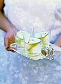 Apple sorbet with apple slices in glasses