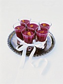 Cold beetroot soup with orange in glasses