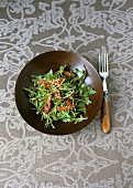 Rocket salad with marinated beef and sesame seeds