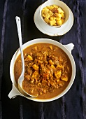 Lamb and coconut curry with mango