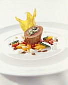 Stuffed veal fillet on peppers