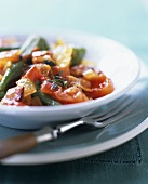 Okra pods with tomatoes and bacon