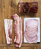 Various types of bacon, slices and pieces