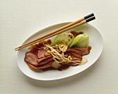 Smoked duck breast with sprouts and baby pak choi