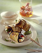 Aubergine rolls filled with sheep's cheese and spicy spread