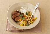 Fried duck breast with swede, papaya and coconut