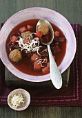Beetroot and potato soup with meatballs