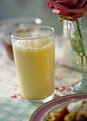A glass of orange buttermilk for breakfast