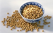 Soya beans in and beside a bowl