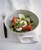 Prawns and peas on watermelon