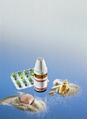 Homeopathic remedies, sand, shells