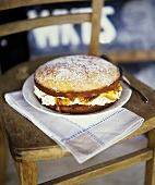 Cake filled with whipped cream and orange marmalade