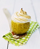A baked apple with a meringue lid