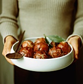 Meatballs with cranberries, wrapped in ham